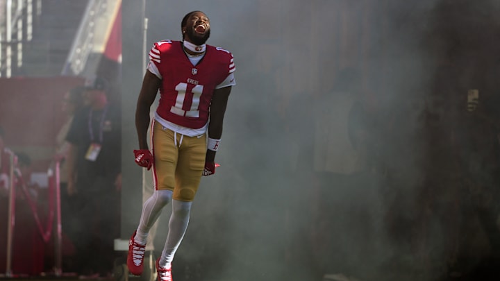 Sep 9, 2024; Santa Clara, California, USA; San Francisco 49ers wide receiver Brandon Aiyuk (11) is introduced to the crowd before the game against the New York Jets at Levi's Stadium. Mandatory Credit: Darren Yamashita-Imagn Images