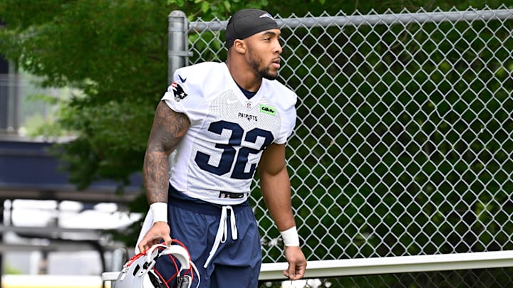 Jun 9, 2025; Foxborough, MA, USA; New England Patriots running back TreVeyon Henderson (32) walks to the practice fields at Gillette Stadium. Mandatory Credit: Eric Canha-Imagn Images