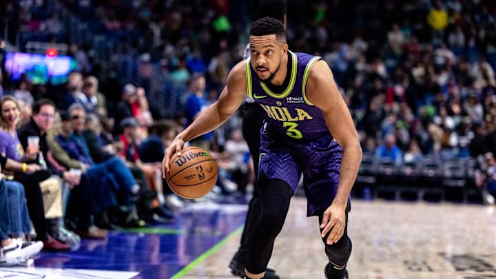 Dec 30, 2024; New Orleans, Louisiana, USA; New Orleans Pelicans guard CJ McCollum (3) dribbles against the LA Clippers during the first half at Smoothie King Center. Mandatory Credit: Stephen Lew-Imagn Images