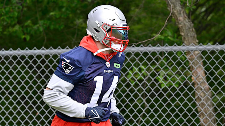 Jun 9, 2025; Foxborough, MA, USA; New England Patriots linebacker Robert Spillane (14) walks to the practice fields at Gillette Stadium. Mandatory Credit: Eric Canha-Imagn Images Jun 9, 2025; Foxborough, MA, USA; New England Patriots linebacker Robert Spillane (14) walks to the practice fields at Gillette Stadium. Mandatory Credit: Eric Canha-Imagn Images