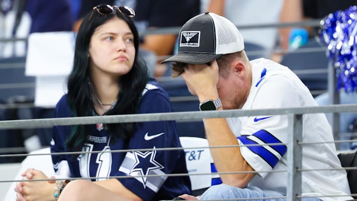 Dallas Cowboys fans react during the second half against the Baltimore Ravens at AT&T Stadium. 