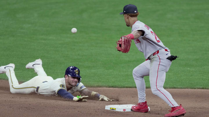 Milwaukee Brewers shortstop Joey Ortiz (3) beats the throw to Boston Red Sox second baseman Kristian Campbell (28) during the eighth inning of their game Tuesday, May 27, 2025 at American Family Field in Milwaukee, Wisconsin. Milwaukee Brewers shortstop Joey Ortiz (3) beats the throw to Boston Red Sox second baseman Kristian Campbell (28) during the eighth inning of their game Tuesday, May 27, 2025 at American Family Field in Milwaukee, Wisconsin.