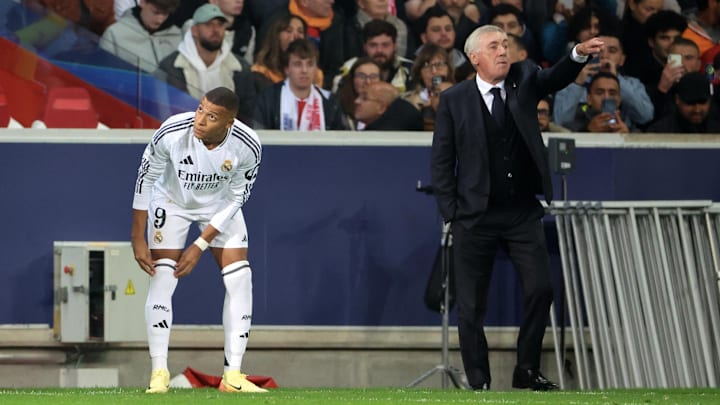 Carlo Ancelotti (right) has always rushed to Kylian Mbappe's defence