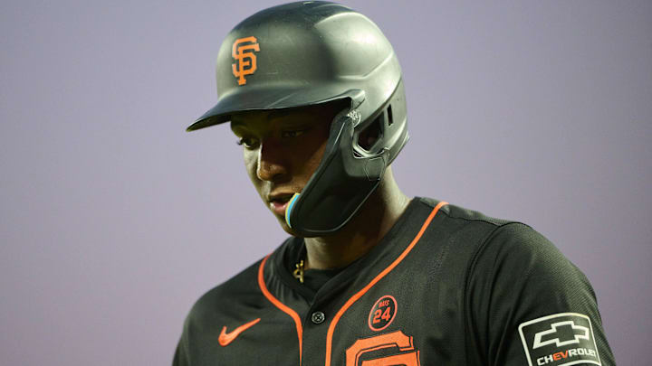 San Francisco Giants infielder Marco Luciano reacts after striking out against the San Diego Padres at Oracle Park. San Francisco Giants infielder Marco Luciano reacts after striking out against the San Diego Padres at Oracle Park.