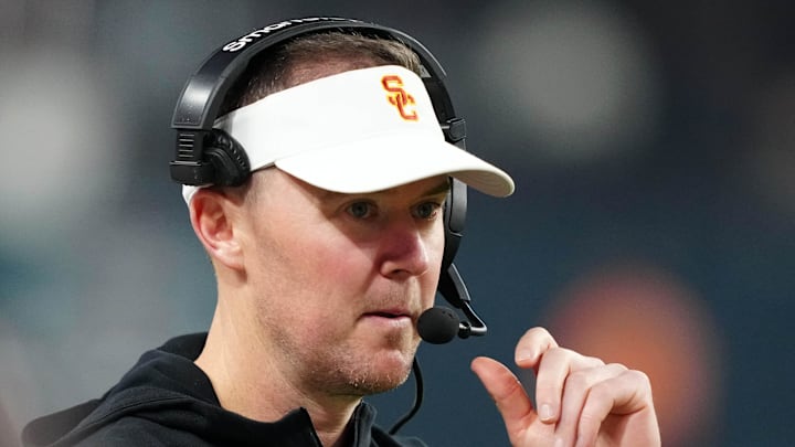 Dec 27, 2024; Las Vegas, NV, USA; Southern California Trojans head coach Lincoln Riley reacts against the Texas A&M Aggies in the second half at Allegiant Stadium. Mandatory Credit: Kirby Lee-Imagn Images