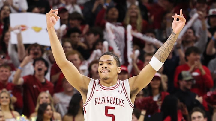 Mar 4, 2026; Fayetteville, Arkansas, USA; Arkansas Razorbacks guard Darius Acuff Jr (5) celebrates after a play against the Texas Longhorns during the first half at Bud Walton Arena. Mandatory Credit: Nelson Chenault-Imagn Images