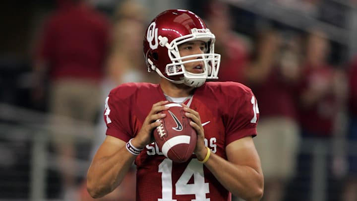 Sep 5, 2009; Arlington, TX, USA; Oklahoma Sooners quarterback Sam Bradford (14) warms up before the game against the BYU Cougars at Cowboys Stadium. Mandatory Credit: Tim Heitman-Imagn Images