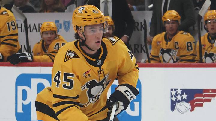 Pittsburgh Penguins defenseman Harrison Brunicke (45) skates with the puck against the New York Islanders during the first period at PPG Paints Arena. Mandatory Credit: Charles LeClaire-Imagn Images