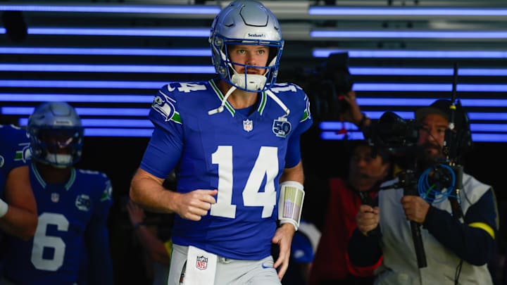 Oct 5, 2025; Seattle, Washington, USA; Seattle Seahawks quarterback Sam Darnold (14) takes the field prior to a game against the Tampa Bay Buccaneers at Lumen Field. 