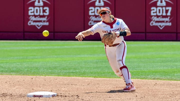 Oklahoma shortstop Gabbie Garcia throws to first base against Kansas.