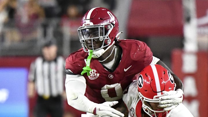 Sep 28, 2024; Tuscaloosa, Alabama, USA; Alabama Crimson Tide linebacker Deontae Lawson (0) sacks Georgia Bulldogs quarterback Carson Beck (15) for a loss at Bryant-Denny Stadium. Alabama defeated Georgia 41-34. Mandatory Credit: Gary Cosby Jr.-Imagn Images Sep 28, 2024; Tuscaloosa, Alabama, USA; Alabama Crimson Tide linebacker Deontae Lawson (0) sacks Georgia Bulldogs quarterback Carson Beck (15) for a loss at Bryant-Denny Stadium. Alabama defeated Georgia 41-34. Mandatory Credit: Gary Cosby Jr.-Imagn Images