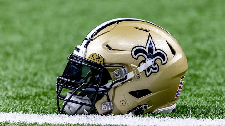Jan 7, 2024; New Orleans, Louisiana, USA; Detailed view of the New Orleans Saints helmet during warmups against the Atlanta Falcons at Caesars Superdome. Mandatory Credit: Stephen Lew-Imagn Images