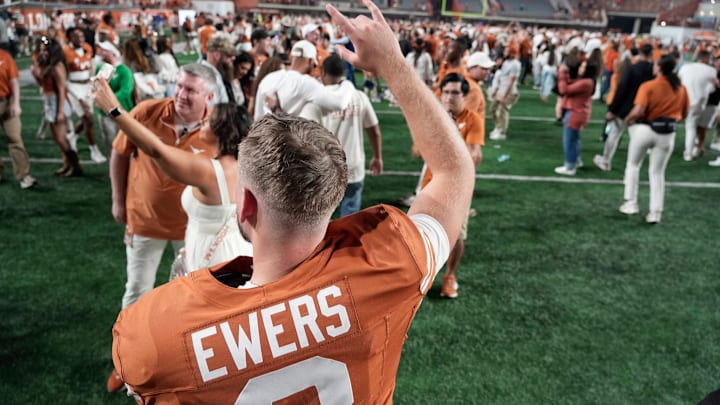 Texas Longhorns quarterback Quinn Ewers (3) waves to a fan at his last home game after wining against Kentucky Wildcats 31-14 in a NCAA college football game at Darrell K Royal Texas Memorial Stadium, Austin, Texas, Saturday, Nov 24, 2024.