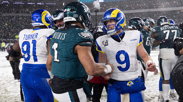 Jan 19, 2025; Philadelphia, Pennsylvania, USA; Philadelphia Eagles quarterback Jalen Hurts (1) and Los Angeles Rams quarterback Matthew Stafford (9) shake hands after a 2025 NFC divisional round game at Lincoln Financial Field. Mandatory Credit: Bill Streicher-Imagn Images