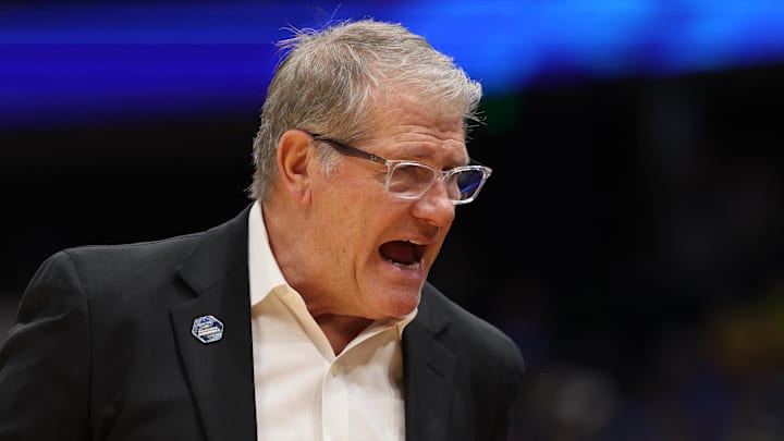 Apr 4, 2025; Tampa, FL, USA;  Connecticut Huskies head coach Geno Auriemma reacts during first quarter in a semifinal of the women's 2025 NCAA tournament against the UCLA Bruins at Amalie Arena. Mandatory Credit: Nathan Ray Seebeck-Imagn Images