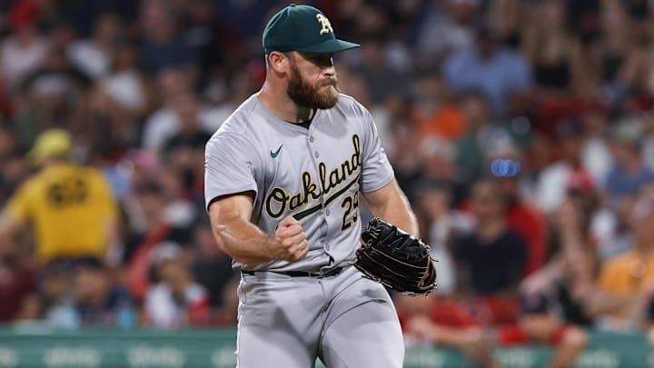 Jul 10, 2024; Boston, Massachusetts, USA; Oakland Athletics relief pitcher Austin Adams (29) reacts during the sixth inning against the Boston Red Sox at Fenway Park. Mandatory Credit: Paul Rutherford-Imagn Images Jul 10, 2024; Boston, Massachusetts, USA; Oakland Athletics relief pitcher Austin Adams (29) reacts during the sixth inning against the Boston Red Sox at Fenway Park. Mandatory Credit: Paul Rutherford-Imagn Images