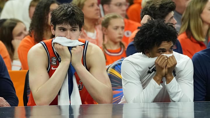 Apr 4, 2026; Indianapolis, IN, USA; Illinois Fighting Illini players react from the bench against the Connecticut Huskies in the second half during a semifinal of the Final Four of the men's 2026 NCAA Tournament at Lucas Oil Stadium. Mandatory Credit: Robert Deutsch-Imagn Images Apr 4, 2026; Indianapolis, IN, USA; Illinois Fighting Illini players react from the bench against the Connecticut Huskies in the second half during a semifinal of the Final Four of the men's 2026 NCAA Tournament at Lucas Oil Stadium. Mandatory Credit: Robert Deutsch-Imagn Images