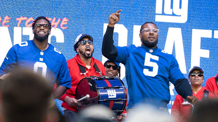 Apr 25, 2024; East Rutherford, NJ, USA; (Left) NY Giants #0 Brian Burns and #5 Kayvon Thibodeaux