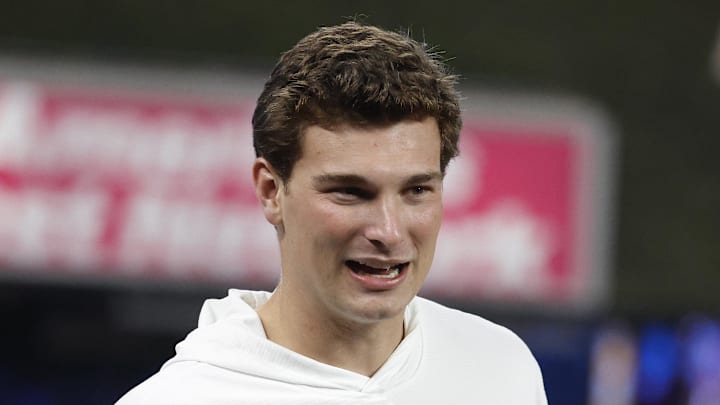 Apr 21, 2026; Miami, Florida, USA;  Indiana Hoosiers quarterback Fernando Mendoza prepares to throw the ceremonial first pitch before a game between the Miami Marlins and the St. Louis Cardinals at loanDepot Park. Mandatory Credit: Rhona Wise-Imagn Images