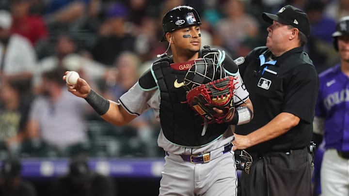 Sep 16, 2024; Denver, Colorado, USA; Arizona Diamondbacks catcher Gabriel Moreno (14) during the fifth inning against the Colorado Rockies at Coors Field. Mandatory Credit: Ron Chenoy-Imagn Images