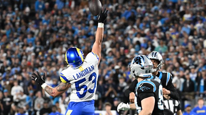 Jan 10, 2026; Charlotte, NC, USA; Los Angeles Rams linebacker Nate Landman (53) blocks a pass by Carolina Panthers quarterback Bryce Young (9) intended for tight end Mitchell Evans (84) in the fourth quarter in an NFC Wild Card Round game at Bank of America Stadium. Mandatory Credit: Bob Donnan-Imagn Images