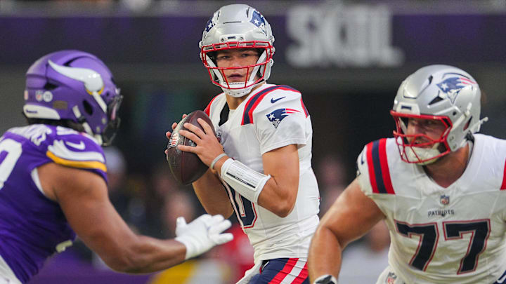 Aug 16, 2025; Minneapolis, Minnesota, USA; New England Patriots quarterback Drake Maye (10) drops back to pass against the Minnesota Vikings in the first quarter at U.S. Bank Stadium. 