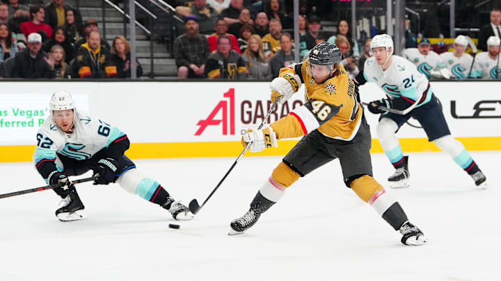 Jonas Rondbjerg shoots the puck past Brandon Montour on Saturday night