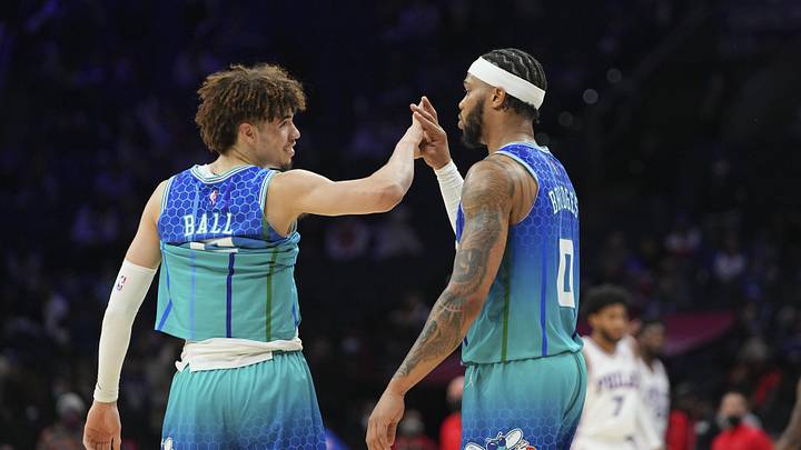 Jan 12, 2022; Philadelphia, Pennsylvania, USA; Charlotte Hornets guard LaMelo Ball (2) celebrates with forward Miles Bridges (0) after the game against the Philadelphia 76ers at the Wells Fargo Center. Mandatory Credit: Mitchell Leff-Imagn Images Jan 12, 2022; Philadelphia, Pennsylvania, USA; Charlotte Hornets guard LaMelo Ball (2) celebrates with forward Miles Bridges (0) after the game against the Philadelphia 76ers at the Wells Fargo Center. Mandatory Credit: Mitchell Leff-Imagn Images
