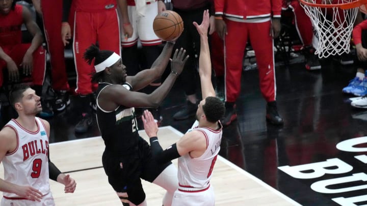 Bucks guard Jrue Holiday drives to the basket past Bulls guard Zach LaVine in the first half on Bucks guard Jrue Holiday drives to the basket past Bulls guard Zach LaVine in the first half on