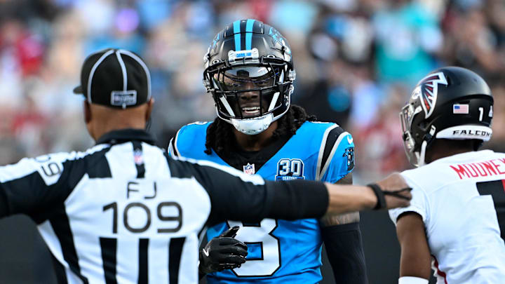 Oct 13, 2024; Charlotte, North Carolina, USA;  Carolina Panthers cornerback Jaycee Horn (8) is called for pass interferference on a pass intended for Atlanta Falcons wide receiver Darnell Mooney (1) in the first quarter at Bank of America Stadium. Mandatory Credit: Bob Donnan-Imagn Images