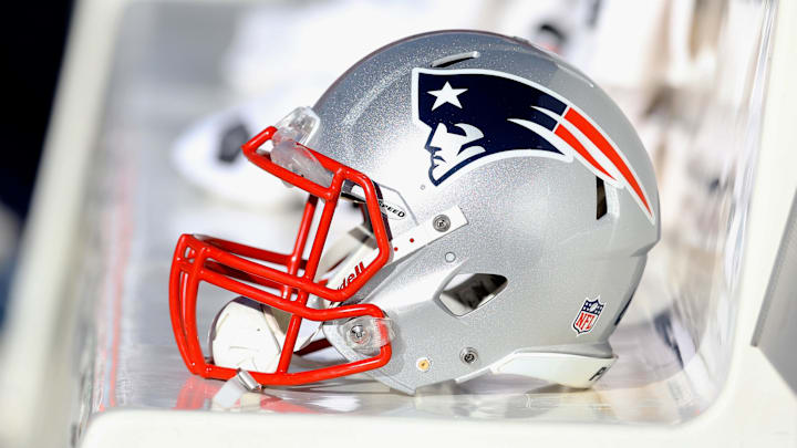 January 19, 2014; Denver, CO, USA; Detailed view of a New England Patriots helmet on the bench during the game against the Denver Broncos in the 2013 AFC Championship football game at Sports Authority Field at Mile High. Mandatory Credit: Mark J. Rebilas-Imagn Images