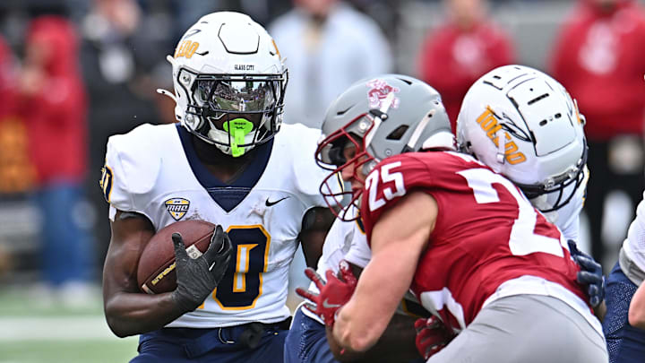 Oct 25, 2025; Pullman, Washington, USA; Toledo Rockets running back Kenji Christian (10) carries the ball against the Washington State Cougars in the second half at Gesa Field at Martin Stadium. Mandatory Credit: James Snook-Imagn Images