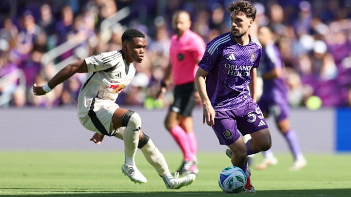 Apr 12, 2025; Orlando, Florida, USA; Orlando City midfielder Joran Gerbet (35) controls the ball against the New York Red Bulls in the first half at Inter&Co Stadium. Mandatory Credit: Nathan Ray Seebeck-Imagn Images