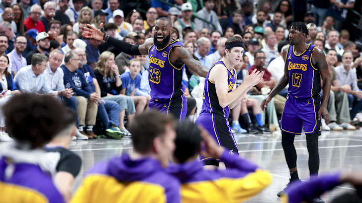 Apr 9, 2025; Dallas, Texas, USA: Los Angeles Lakers guard Austin Reaves (15) reacts with Los Angeles Lakers forward LeBron James (23) after dunking against the Dallas Mavericks during the second quarter at American Airlines Center. Mandatory Credit: Kevin Jairaj-Imagn Images Apr 9, 2025; Dallas, Texas, USA: Los Angeles Lakers guard Austin Reaves (15) reacts with Los Angeles Lakers forward LeBron James (23) after dunking against the Dallas Mavericks during the second quarter at American Airlines Center. Mandatory Credit: Kevin Jairaj-Imagn Images