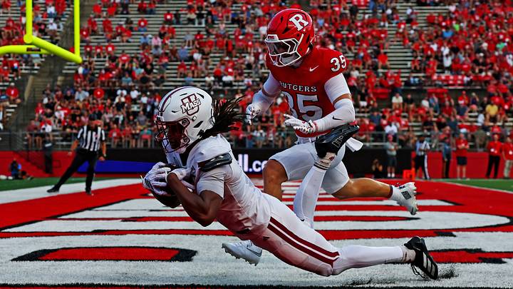 Sep 3, 2026; Piscataway, New Jersey, USA;  Massachusetts Minutemen wide receiver Joseph Griffin Jr. (1)  makes a touchdown catch during the second quarter against the Rutgers Scarlet Knights at SHI Stadium.  Mandatory Credit: Vincent Carchietta-Imagn Images
