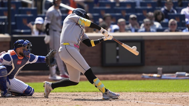 May 1, 2025; New York City, New York, USA; Arizona Diamondbacks shortstop Geraldo Perdomo (2) hits a home run against the New York Mets during the seventh inning at Citi Field. Mandatory Credit: Gregory Fisher-Imagn Images