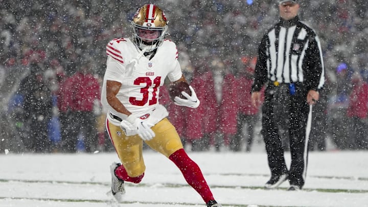 Dec 1, 2024; Orchard Park, New York, USA; San Francisco 49ers running back Isaac Guerendo (31) runs with the ball for a touchdown against the Buffalo Bills during the second half at Highmark Stadium. Mandatory Credit: Gregory Fisher-Imagn Images Dec 1, 2024; Orchard Park, New York, USA; San Francisco 49ers running back Isaac Guerendo (31) runs with the ball for a touchdown against the Buffalo Bills during the second half at Highmark Stadium. Mandatory Credit: Gregory Fisher-Imagn Images