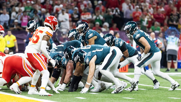 Feb 9, 2025; New Orleans, LA, USA; Philadelphia Eagles  quarterback Jalen Hurts (1) lines up for the tush push play on the goal line against the Kansas City Chiefs during Super Bowl LIX at Ceasars Superdome. Mandatory Credit: Mark J. Rebilas-Imagn Images