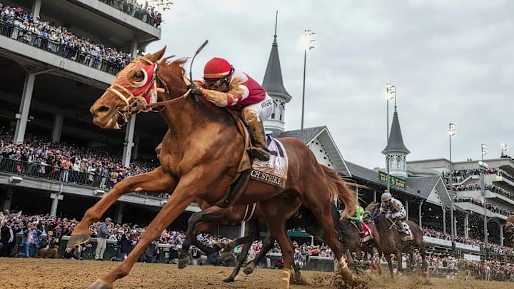 Rich Strike, with Sonny Leon aboard, wins the 148th running of the Kentucky Derby in 2022.