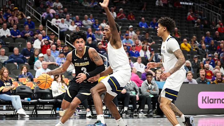 Mar 12, 2025; Kansas City, MO, USA; Colorado Buffaloes guard Julian Hammond III (3) drives to the basket during the second half against the West Virginia Mountaineers at T-Mobile Center. Mandatory Credit: William Purnell-Imagn Images