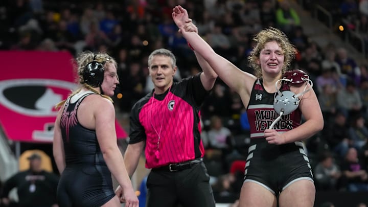 Mount Vernon   s Libby Dix, right, gets her hand raised after defeating S.W.A.T. Valkyrie Grace Britten at 170 pound during the semifinals of the IGHSAU state girls wrestling tournament at Xtream Arena in Coralville, Iowa on Friday, Feb. 3, 2023.
