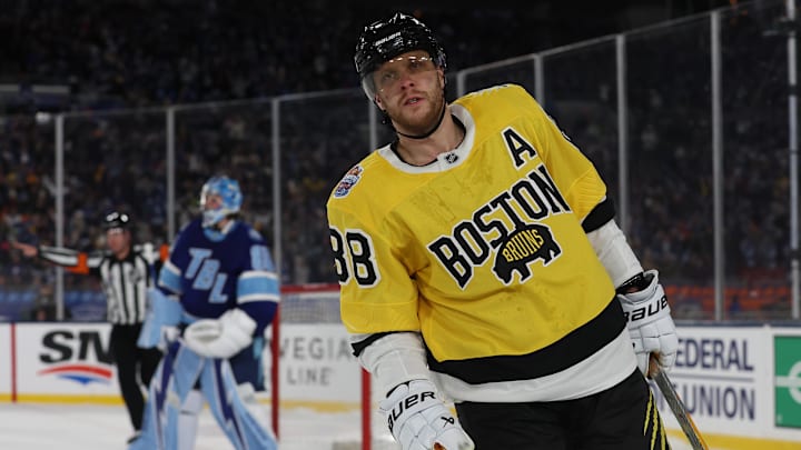 Feb 1, 2026; Tampa Bay, Florida, USA; Boston Bruins right wing David Pastrnak (88) reacts after missing during a shootout in the 2026 Stadium Series ice hockey game against the Tampa Bay Lightning at Raymond James Stadium. Mandatory Credit: Kim Klement Neitzel-Imagn Images