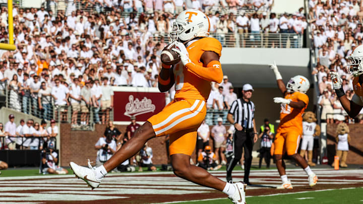Sep 27, 2025; Starkville, Mississippi, USA; Tennessee Volunteers defensive back Colton Hood (8) scores a touchdown after an interception against the Mississippi State Bulldogs during the first half at Davis Wade Stadium at Scott Field. Mandatory Credit: Wesley Hale-Imagn Images