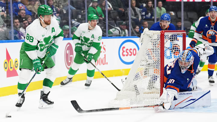 Mar 17, 2026; Toronto, Ontario, CAN; Toronto Maple Leafs right wing William Nylander (88) controls the puck behind the net as New York Islanders goaltender Ilya Sorokin (30) tries to puck check during the third period at Scotiabank Arena. Mandatory Credit: Nick Turchiaro-Imagn Images