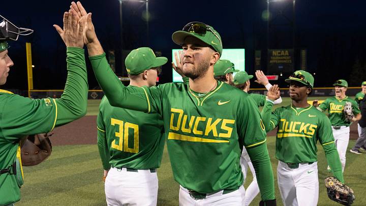 Oregon’s Angel Laya, center, celebrates the Ducks' victory over George Mason Feb. 13, 2026 at PK Park in Eugene. Oregon’s Angel Laya, center, celebrates the Ducks' victory over George Mason Feb. 13, 2026 at PK Park in Eugene.