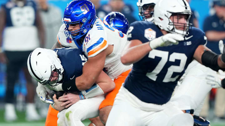 Boise State Broncos defensive end Ahmed Hassanein sacks Penn State Nittany Lions quarterback Drew Allar.