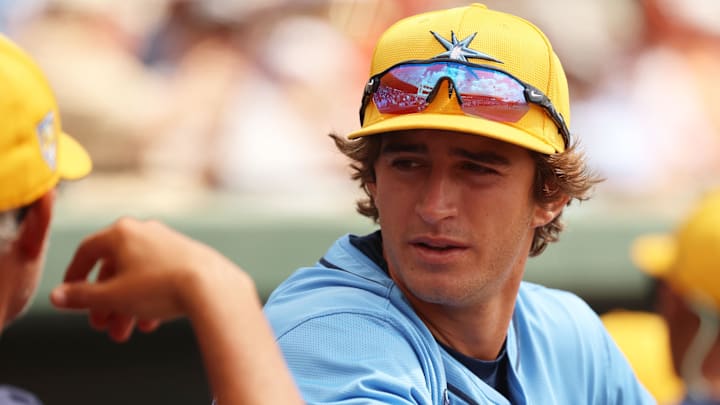 Tampa Bay Rays infielder Carson Williams (80) talks with manager Kevin Cash (16) before the game against the Baltimore Orioles at Ed Smith Stadium in Sarasota, Fla., on March 12, 2024. Tampa Bay Rays infielder Carson Williams (80) talks with manager Kevin Cash (16) before the game against the Baltimore Orioles at Ed Smith Stadium in Sarasota, Fla., on March 12, 2024.