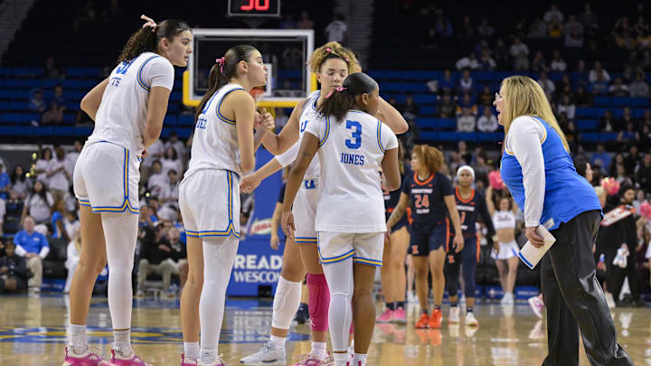 Feb 20, 2025; Los Angeles, California, USA; UCLA Bruins head coach Cori Close talks to her players center Lauren Betts (51), guard Gabriela Jaquez (11), guard Kiki Rice (1) and guard Londynn Jones (3) during the fourth quarter at Pauley Pavilion presented by Wescom. Mandatory Credit: Robert Hanashiro-Imagn Images Feb 20, 2025; Los Angeles, California, USA; UCLA Bruins head coach Cori Close talks to her players center Lauren Betts (51), guard Gabriela Jaquez (11), guard Kiki Rice (1) and guard Londynn Jones (3) during the fourth quarter at Pauley Pavilion presented by Wescom. Mandatory Credit: Robert Hanashiro-Imagn Images