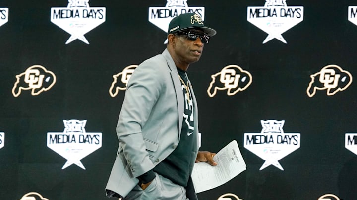 Jul 9, 2025; Frisco, TX, USA; Colorado head coach Deion Sanders walks onto the stage during 2025 Big 12 Football Media Days at The Star. Mandatory Credit: Raymond Carlin III-Imagn Images