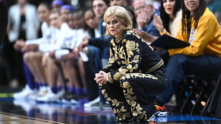 Mar 28, 2025; Spokane, WA, USA; LSU Lady Tigers head coach Kim Mulkey looks on against the NC State Wolfpack during the first half of a Sweet 16 NCAA Tournament basketball game at Spokane Arena. Mandatory Credit: James Snook-Imagn Images Mar 28, 2025; Spokane, WA, USA; LSU Lady Tigers head coach Kim Mulkey looks on against the NC State Wolfpack during the first half of a Sweet 16 NCAA Tournament basketball game at Spokane Arena. Mandatory Credit: James Snook-Imagn Images